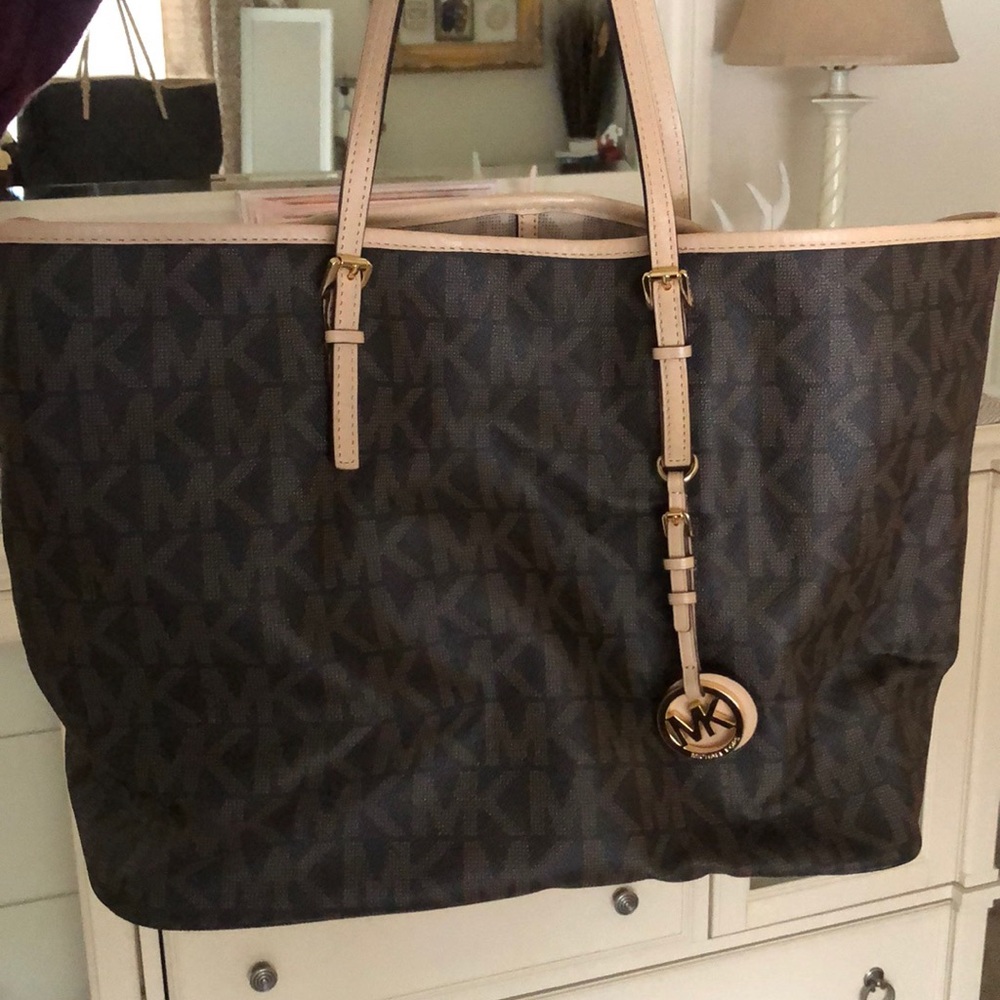 Brown with tan MK on it